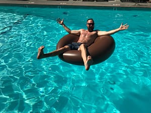 Josh In Pool With Floatie
